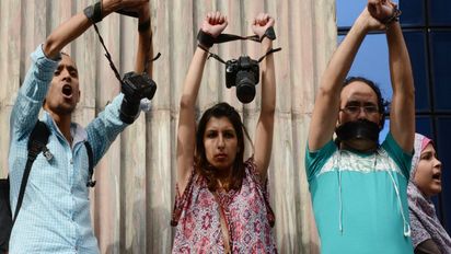 May 3, 2016 - Cairo, Cairo, Egypt - Egyptian Journalists take part during a protest against the arrests of fellow journalists outside the Egyptian Journalist syndicate headquarters in the capital Cairo on May 3, 2016 on the occasion of World Press Freedom day