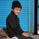 Ubaidullo Norisow (12, 6. Klasse) arbeitet auf dem Kelechek Markt in Bishkek. Mit seiner Mutter Farida Norisowaund Schwester Gulmairam (14) sammelt er jeden Tag Pappe und Papier auf dem Grossmarkt um das Familieneinkommen zu sichern. CPC unterstuetzt die Kinder damit sie trotzdem eine Ausbildung, genuegend Essen und medizinische Versorgung bekommen. (c) 2013 Kathrin Harms