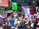 Manche Frauauf diesem Marsch in Mexiko City trauert nicht nur um ein Kind, sondern um zwei, drei oder vier. 