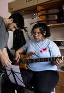 Anabella Jazmin MuÃ±oz, 16, during her lesson with some friends in ASE center, San Fernando, Province of Buenos Aires, Argentina on November 18, 2025. Photographer : Anita Pouchard Serra.