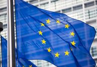 EU flag in front of Berlaymont building facade