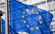 EU flag in front of Berlaymont building facade