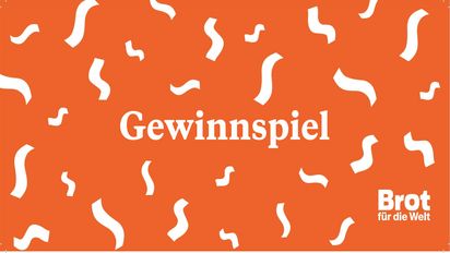 Karte mit Konfetti und der Aufschrift Gewinnspiel, Orange und Weiß