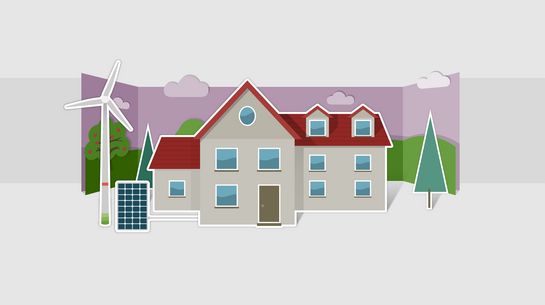 Haus mit Windkraft- und Solaranlage