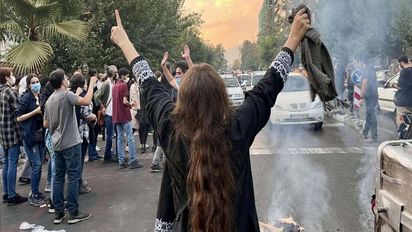 Sep 28, 2022, Tehran, Iran: Iranian women are on the front line of the protests and are fighting against the agents of repression. Mahsa Amini, a 22-year-old Iranian woman, was arrested in Tehran on 13 September by the morality police, a unit responsible for enforcing Iran's strict dress code for women. She fell into a coma while in police custody and was declared dead on 16 September, with the authorities saying she died of heart failure while her family advised that she had no prior health conditions. Her death has triggered protests in various areas in Iran and around the world. (Credit Image: Â© Social Media/ZUMA Press