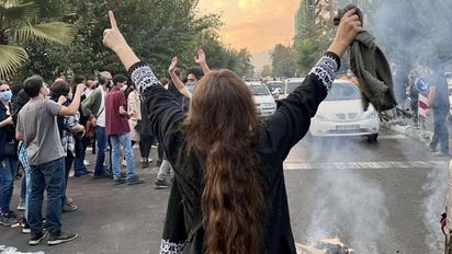 Sep 28, 2022, Tehran, Iran: Iranian women are on the front line of the protests and are fighting against the agents of repression. Mahsa Amini, a 22-year-old Iranian woman, was arrested in Tehran on 13 September by the morality police, a unit responsible for enforcing Iran's strict dress code for women. She fell into a coma while in police custody and was declared dead on 16 September, with the authorities saying she died of heart failure while her family advised that she had no prior health conditions. Her death has triggered protests in various areas in Iran and around the world. (Credit Image: Â© Social Media/ZUMA Press