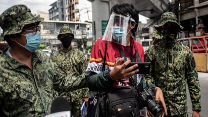 Police officers arrest members and allies of LGBTQIA+ organization Bahaghari during the Pride March Protest in Manila, Philippines on June 26, 2020. At least 20 individuals were brought to the Manila Police District (MPD) Headquarters.(Photo by Lisa Marie David/NurPhoto/picture alliance